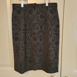 Jillian Jones ladies black tailored embossed design skirt.